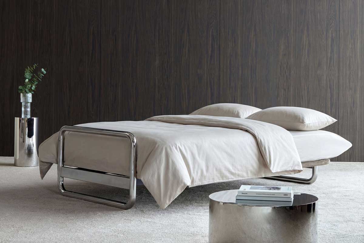 Lomira 140 Sofa Bed Quiltus kot počivalnik v sodobnem dnevnem prostoru