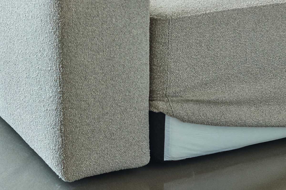 Bližnji posnetek osnove Rund kavča v tkanini Boucle Beige